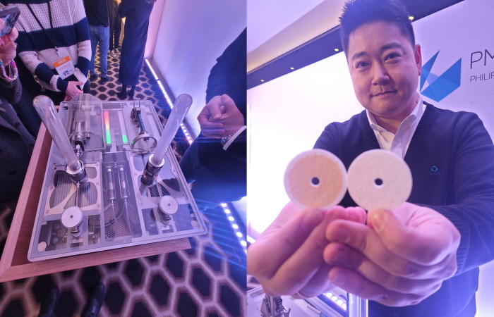 2월 8일 오전 서울 중구 플라자호텔 그랜드볼룸에서 열린 한국필립모리스 ‘아이코스 일루마 원’ 신제품 론칭 행사에서 일반 연초와 궐련형 전자담배의 유해물질 배출 실험 결과를 비교해주고 있는 모습. 사진=김경탁 기자