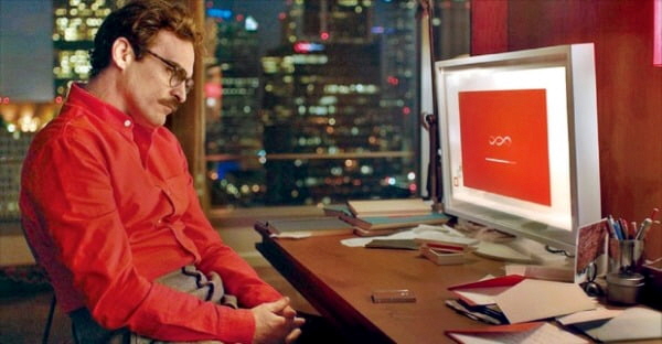 호아킨 피닉스 주연의 영화 '그녀(Her)'의 한 장면. 호아킨 피닉스가 분한 테오도르와 화면 속 인격형 AI 사만다의 모습. 워너브라더스/뉴시스